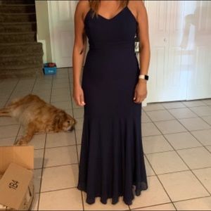 Navy blue spaghetti strap, v-neck chiffon gown.